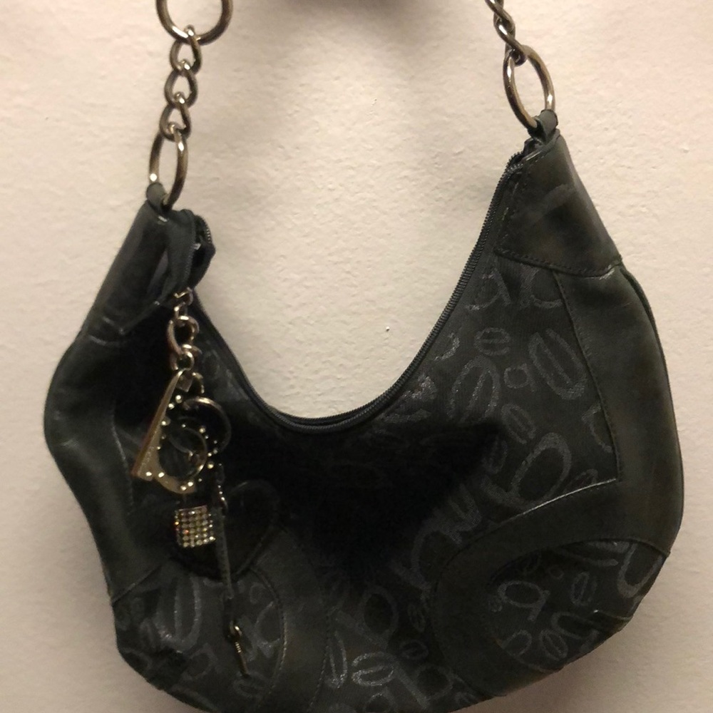 A new Bebe black hobo purse